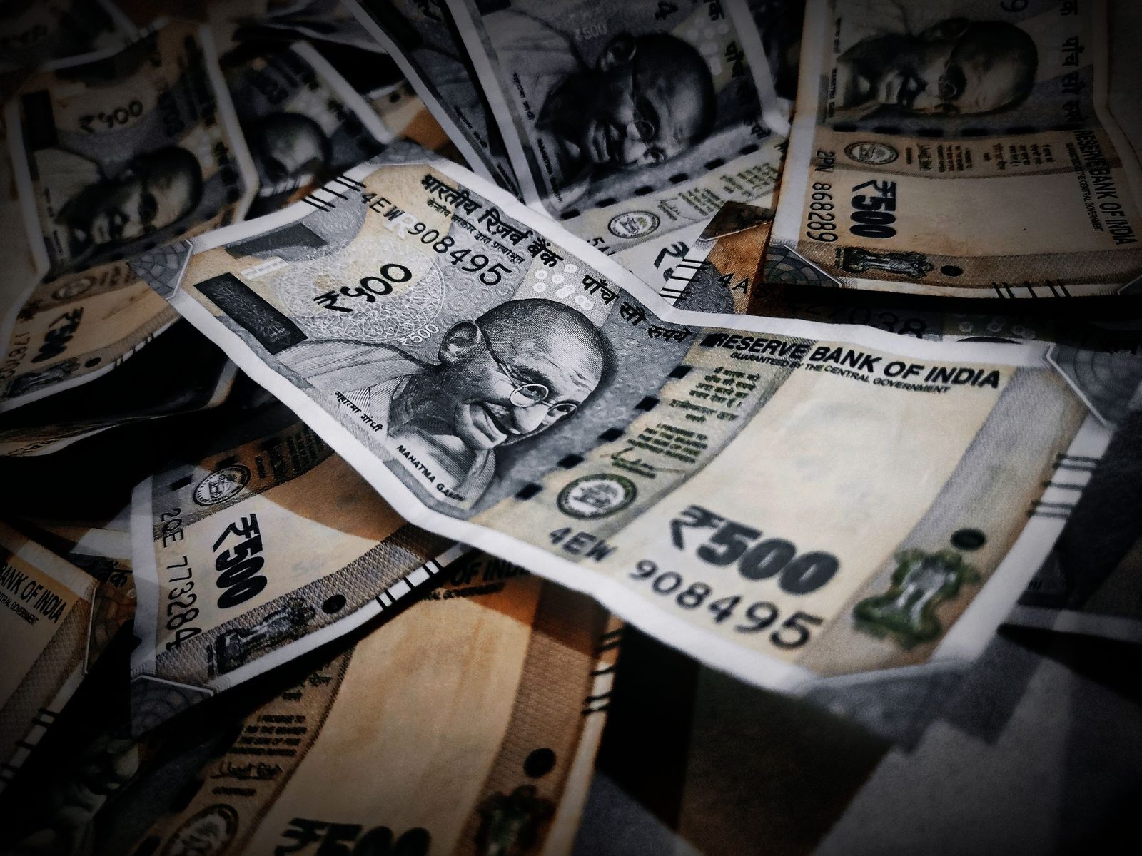 Indian rupee banknotes counted out on a surface